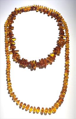 Lot 2446 - Two amber necklaces 101gm