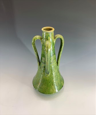 Lot 1053 - An Arts and Crafts period art pottery green...