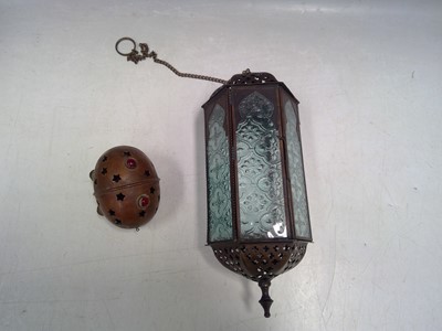 Lot 83 - An ovoid middle-eastern incense burner, 9cm in...