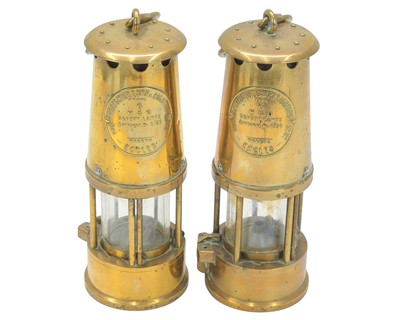 Lot 107 - Two Eccles Type 6 brass miners' safety lamps by the Protector Lamp and Lighting Co Ltd.