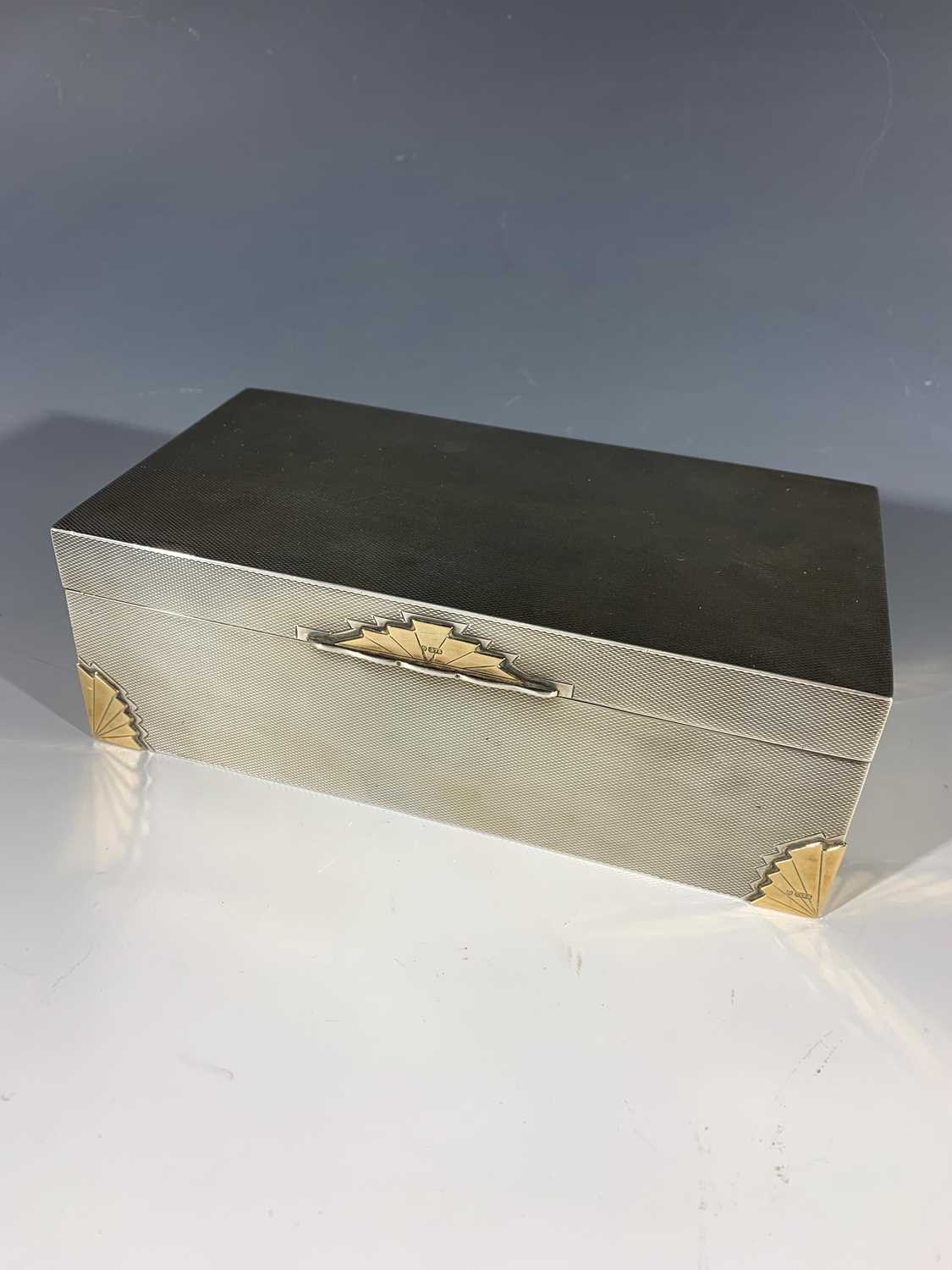 Lot 2017 - A good gold mounted silver cigarette box by...