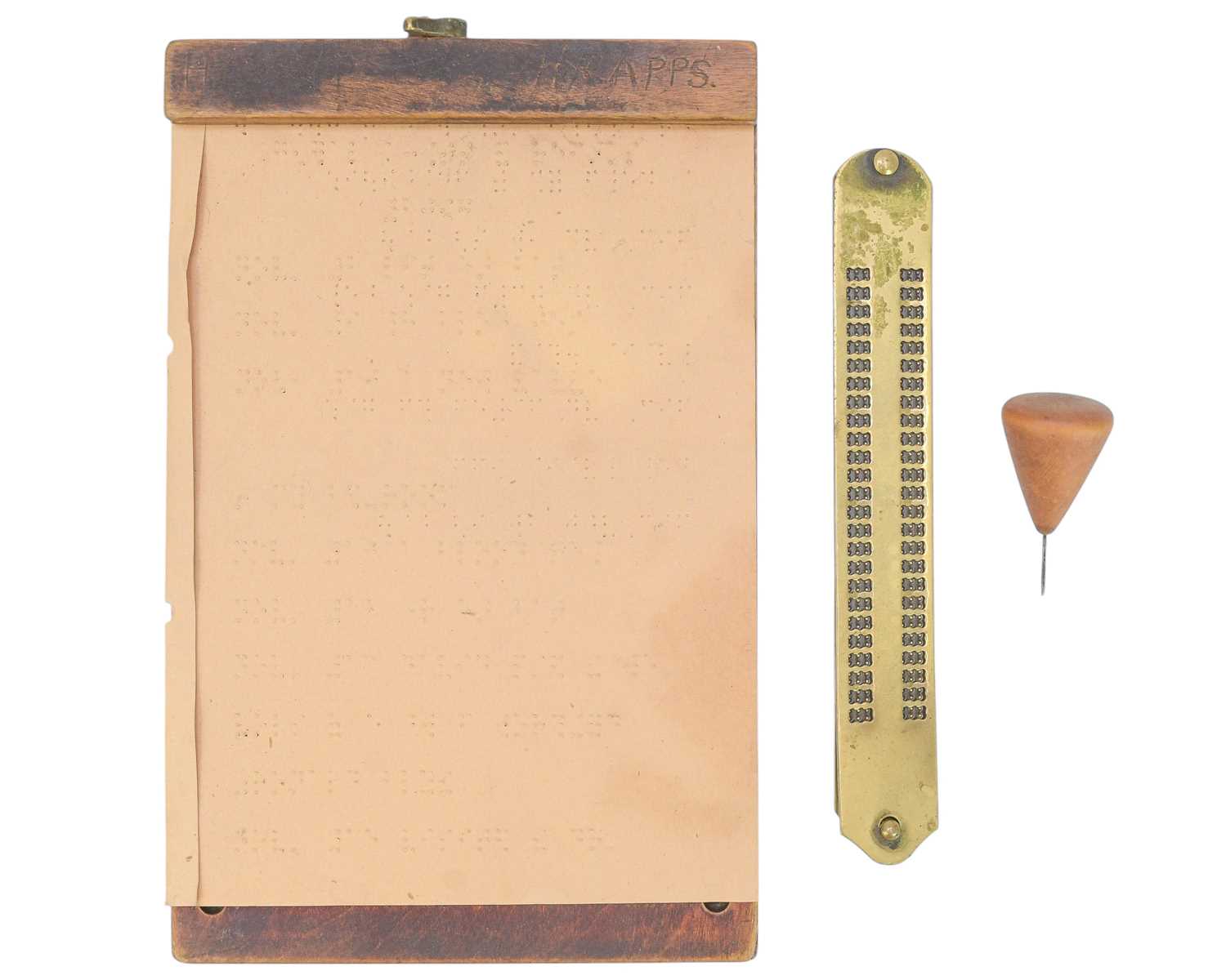 Lot 64 - A braille writing set.