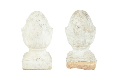 Lot 112 - A pair of reconstituted stone artichoke finals.