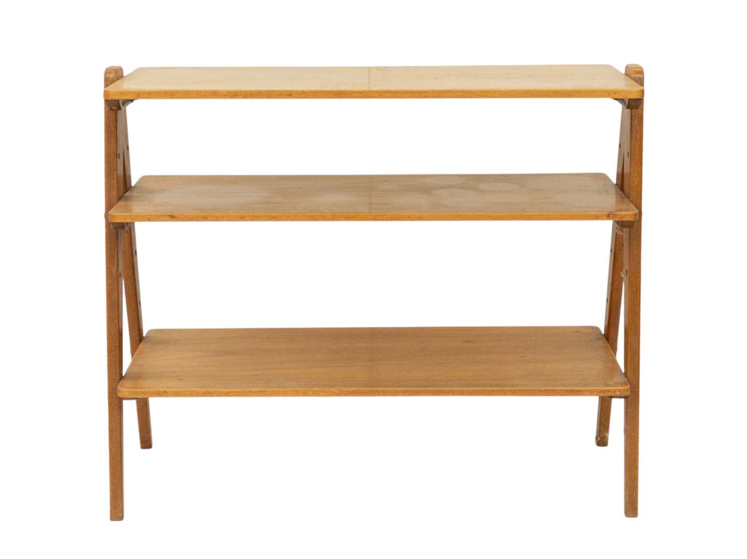Lot 739 - A Nance Workshop mid century walnut shelving unit.