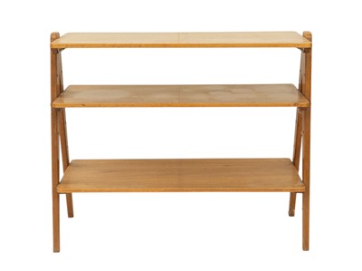 Lot 739 - A Nance Workshop mid century walnut shelving unit.