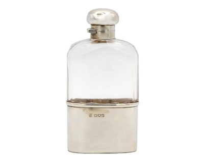 Lot 94 - A George V silver-mounted faceted glass flask by Drew & Sons.
