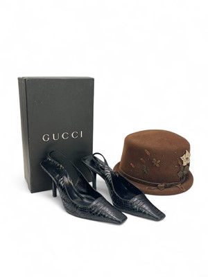 Lot 348 - A pair of vintage Gucci snakeskin effect leather slingback shoes.