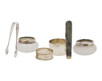 Lot 106 - A selection of small silver items.