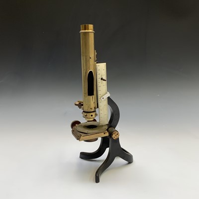 Lot 267 - A brass and black lacquered microscope,...