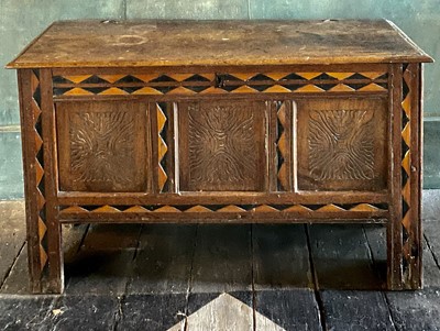 Lot 50 - An oak and inlaid three panel coffer.