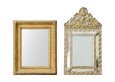 Lot 837 - A late 19th/early 20th century sectional wall mirror with repousse brass frame.