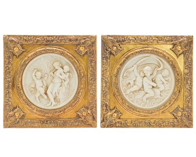 Lot 180 - Two decorative gilt framed wall plaques.