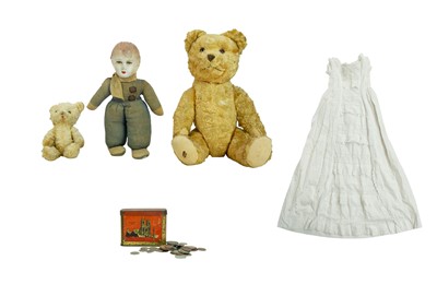 Lot 440 - A 1940s Unica (Belgium) papier mache and cloth doll.