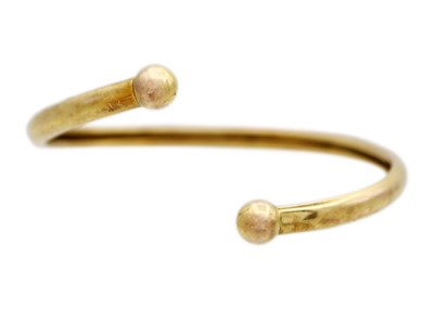 Lot 14 - A gold child's torque bangle.