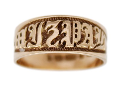 Lot 15 - A 9k gold 'MIZPAH' band ring.