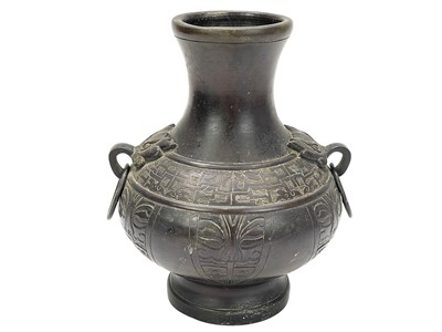 Lot 549 - A Chinese archaic bronze vase.