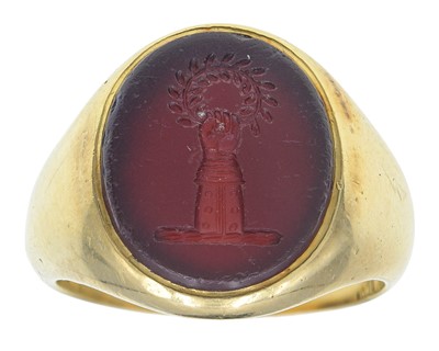 Lot 38 - A Victorian gold and carnelian signet ring.