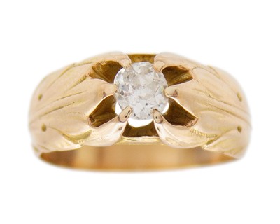 Lot A gold and diamond band ring.
