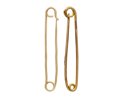 Lot 94 - One gold pin and a gold-plated pin.