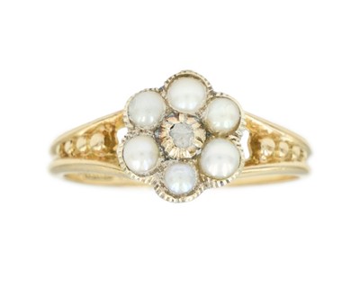 Lot 22 - An Edwardian 18k gold pearl and diamond cluster ring.