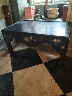 Lot 57 - Lyn Le Grice, A black painted and stencilled side table or stand.