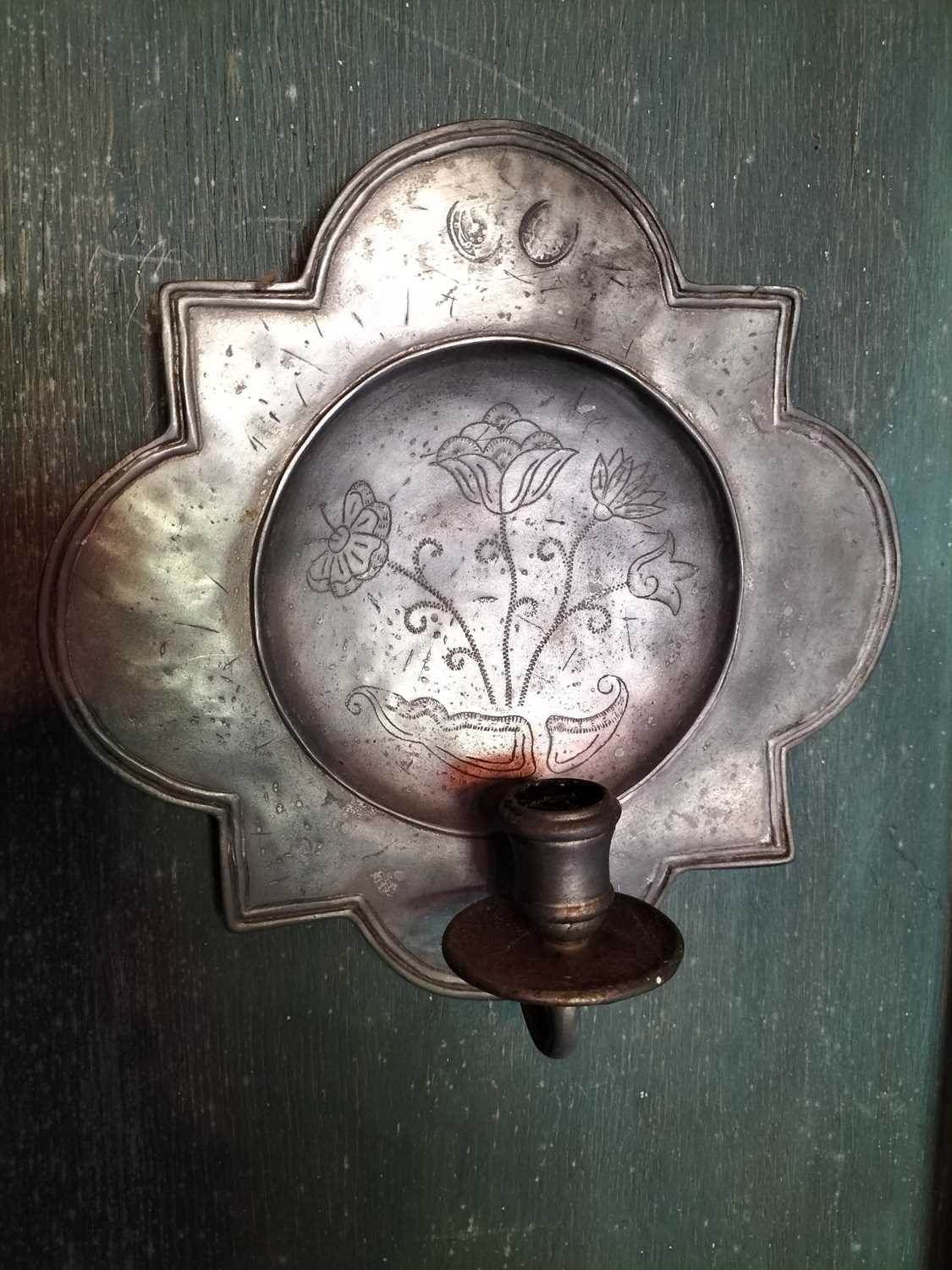 Lot 72 - A pair of pewter candle wall sconces.