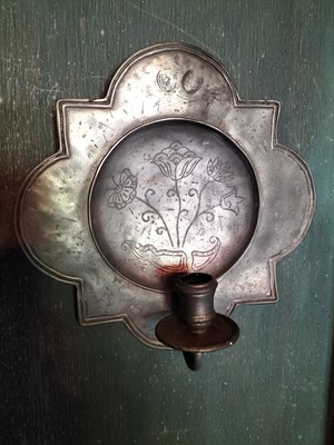 Lot 72 - A pair of pewter candle wall sconces.