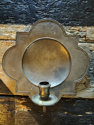 Lot 72 - A pair of pewter candle wall sconces.