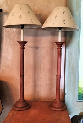 Lot 64 - Two similar painted wood table lamps.
