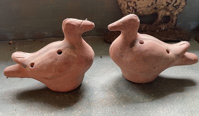 Lot 68 - Two Mexican terracotta bird figure whistles.