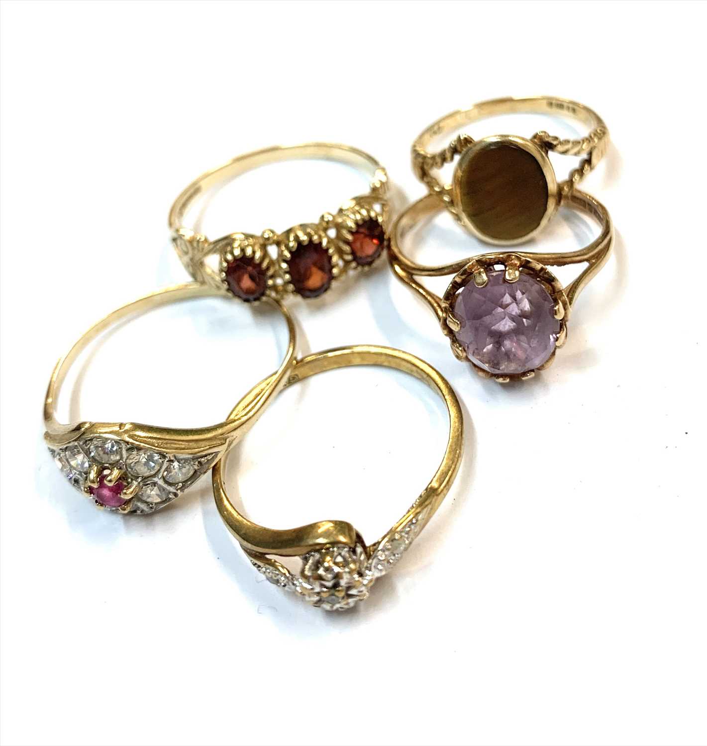 Lot 2502 - Five 9ct gold dress rings