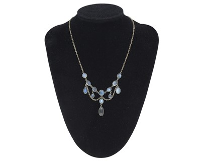 Lot 30 - A moonstone spectacle set silver festoon necklace.