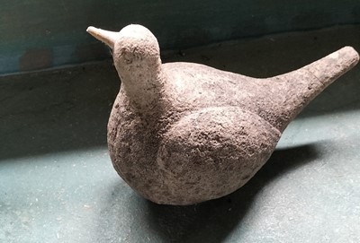 Lot 71 - A reconstituted stone figure of a pigeon.