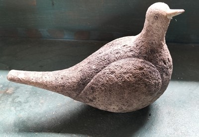 Lot 71 - A reconstituted stone figure of a pigeon.