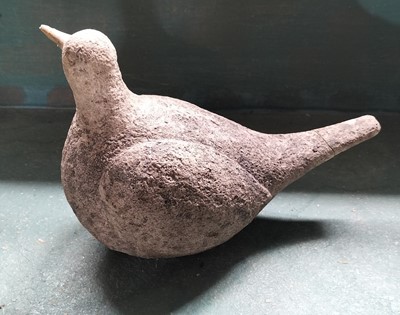 Lot 71 - A reconstituted stone figure of a pigeon.