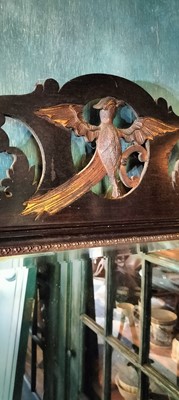 Lot 73 - A George III style mahogany and gilt wall mirror.