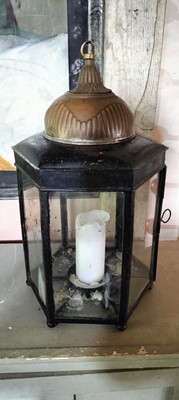 Lot 74 - A brass and painted steel hexagonal glazed candle lantern.
