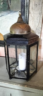 Lot 74 - A brass and painted steel hexagonal glazed candle lantern.