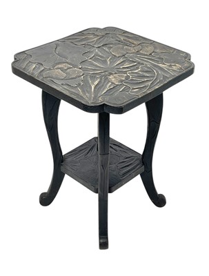 Lot 614 - A Japanese carved ebonised two tier occasional table.