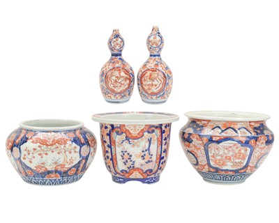 Lot 582 - Three Japanese Imari Jardinieres and a pair of vases.