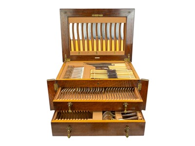 Lot 123 - A canteen of 'rat tail' pattern cutlery - twelve place settings.