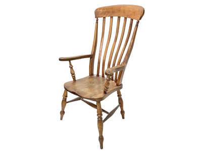 Lot 915 - A Victorian beech and ash kitchen Windsor chair.
