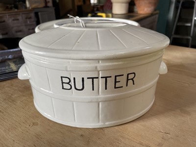 Lot 78 - A White ironstone oval butter dish and cover.