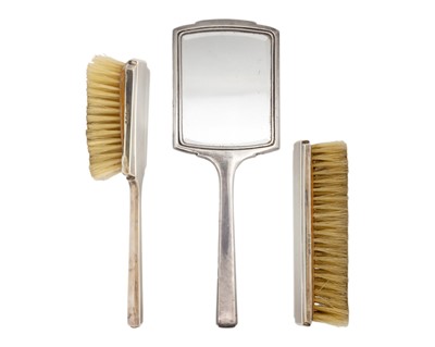 Lot 121 - A modern silver engine turned three-piece dressing table set by Deakin & Francis Ltd.