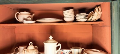 Lot 81 - A shelf of predominantly white glazed china.