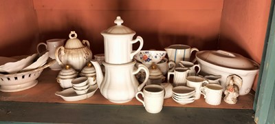Lot 81 - A shelf of predominantly white glazed china.