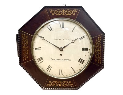 Lot 799 - A Regency rosewood and brass inlaid octagonal wall clock.