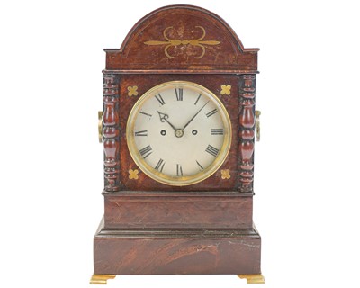 Lot 807 - A 19th century mahogany and brass inlaid mantel clock.