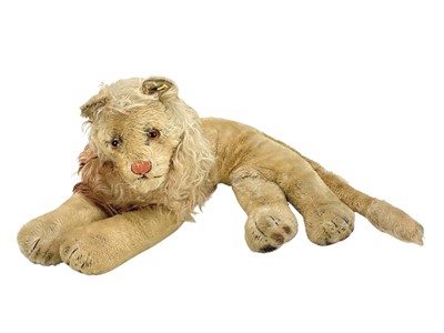 Lot 437 - A Steiff plush-covered lion soft toy with amber glass eyes.