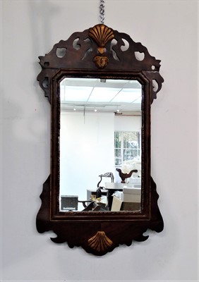 Lot 3479 - A George III mahogany wall mirror, 66 x 37cm.